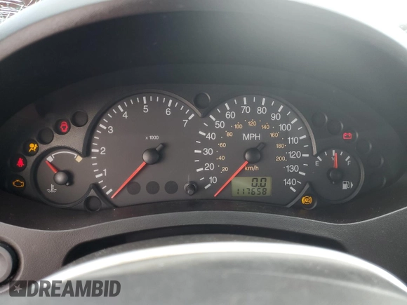 2007 Ford Focus S z VIN 1FAHP37N17W157941, wystawiony jako Copart lot #86057694 z przebiegiem 117 658 mil mil oraz Szkoda całkowita • Salvage title. Historia ofert i sprzedaży dostępna na DreamBid. Obrazek 9.