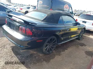 1998 Ford Mustang GT with VIN 1FAFP45X4WF123864, listed as a IAAI auction lot 42028242 with 175,866 mi miles. Bid and sale history available at carsss.com. Image 4.