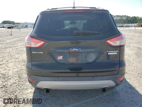 2013 Ford Escape Titanium z VIN 1FMCU0J93DUB60916, wystawiony jako Copart lot #61692595 z przebiegiem 169 691 mil mil oraz Szkoda całkowita • Salvage title. Historia ofert i sprzedaży dostępna na DreamBid. Obrazek 6.