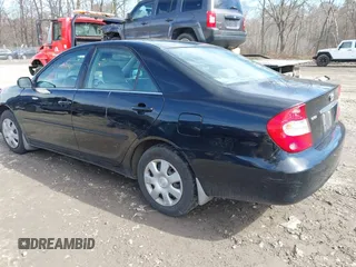2004 Toyota Camry LE with VIN 4T1BE32K94U307994, listed as a IAAI auction lot 41847450 with 164,016 mi miles and . Bid and sale history available at carsss.com. Image 3.