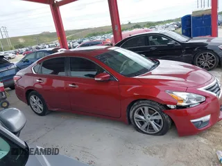 2014 Nissan Altima SL with VIN 1N4AL3AP9EC412891, listed as a IAAI auction lot 41768162 with 113,686 mi miles and . Bid and sale history available at DreamBid. Image 14.