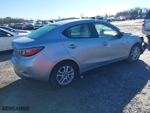 2017 Toyota Yaris iA with VIN 3MYDLBYV6HY183623, listed as a IAAI auction lot 41315274 with 65,635 mi miles. Bid and sale history available at carsss.com. Image 4.