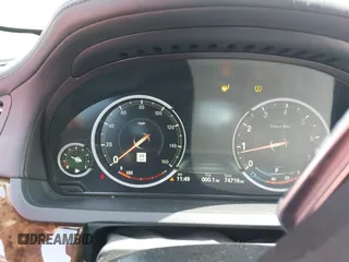 2015 BMW 7 Series 750Li with VIN WBAYE8C5XFD782039, listed as a IAAI auction lot 41505626 with 74,716 mi miles. Bid and sale history available at carsss.com. Image 7.