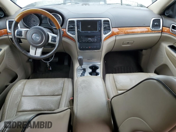 2011 Jeep Grand Cherokee Overland with VIN 1J4RR6GT9BC696319, listed as a Copart auction lot 56914185 with 211,661 mi miles and Salvage title. Bid and sale history available at DreamBid. Image 8.