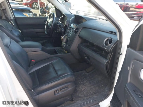 2015 Honda Pilot Touring with VIN 5FNYF4H91FB037290, listed as a IAAI auction lot 40912739 with 154,772 mi miles. Bid and sale history available at carsss.com. Image 5.
