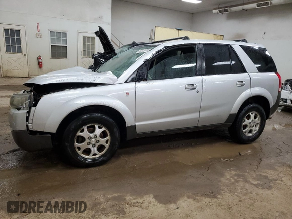 2004 Saturn VUE V6 with VIN 5GZCZ534X4S879501, listed as a Copart auction lot 87015574 with 173,426 mi miles and Clean Title. Bid and sale history available at DreamBid. Image 1.