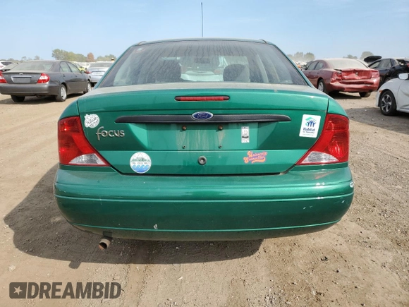 2002 Ford Focus LX with VIN 1FAFP33PX2W150929, listed as a Copart auction lot 71664474 with 61,505 mi miles and Salvage Title. Bid and sale history available at DreamBid. Image 6.