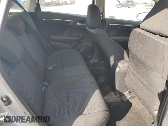 2019 Honda Fit LX z VIN 3HGGK5H41KM712693, wystawiony jako Copart lot #52069275 z przebiegiem 68 522 mil mil oraz Szkoda całkowita • Salvage title. Historia ofert i sprzedaży dostępna na DreamBid. Obrazek 10.