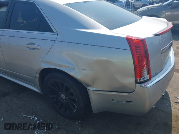 2012 Cadillac CTS with VIN 1G6DC5E51C0156873, listed as a IAAI auction lot 42587421 with 169,006 mi miles and . Bid and sale history available at DreamBid. Image 6.
