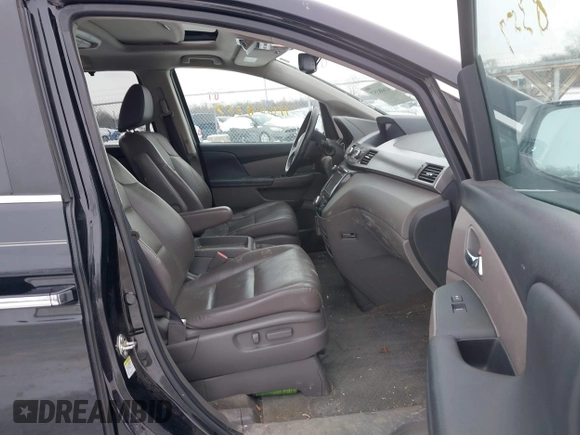 2015 Honda Odyssey EX-L with VIN 5FNRL5H60FB018030, listed as a IAAI auction lot 41608357 with 166,214 mi miles and . Bid and sale history available at carsss.com. Image 5.