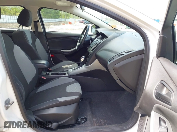 2012 Ford Focus SE with VIN 1FAHP3F2XCL122141, listed as a IAAI auction lot 42008877 with 122,743 mi miles. Bid and sale history available at carsss.com. Image 5.