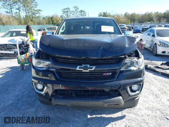 2016 Chevrolet Colorado 2WD Z71 z VIN 1GCGSDE39G1253003, wystawiony jako IAAI lot #41830474 z przebiegiem 74 000 mil mil oraz . Historia ofert i sprzedaży dostępna na DreamBid. Obrazek 13.