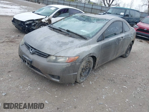 2008 Honda Civic Cpe LX with VIN 2HGFG12608H560476, listed as a IAAI auction lot 41954604 with 288,649 mi miles. Bid and sale history available at carsss.com. Image 2.