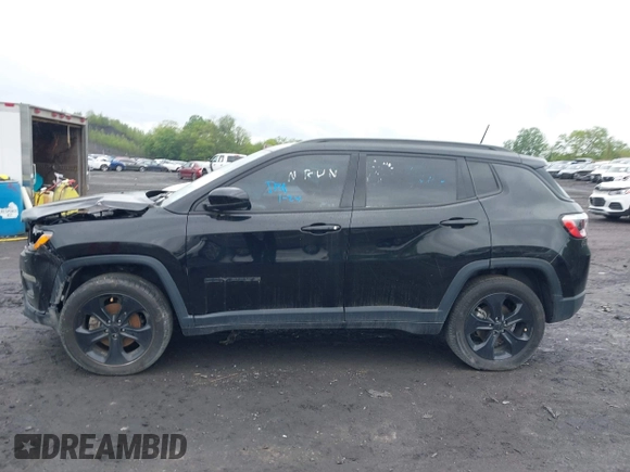 2021 Jeep Compass Latitude with VIN 3C4NJDBB6MT590092, listed as a IAAI auction lot 42351097 with 72,428 mi miles and . Bid and sale history available at DreamBid. Image 14.