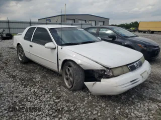 1995 Mercury Cougar z VIN 1MELM62W1SH624477, wystawiony jako Copart lot #56720625 z przebiegiem 156 034 mil mil oraz Szkoda całkowita • Salvage title. Historia ofert i sprzedaży dostępna na DreamBid. Obrazek 4.