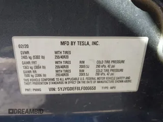 2020 Tesla Model Y Long Range with VIN 5YJYGDEF8LF000658, listed as a IAAI auction lot 41669246 with 44,281 mi miles and . Bid and sale history available at DreamBid. Image 9.