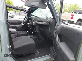 2014 Jeep Wrangler Unlimited Sport with VIN 1C4BJWDG1EL135073, listed as a IAAI auction lot 42435361 with 129,144 mi miles and . Bid and sale history available at DreamBid. Image 5.