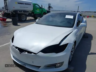 2018 Tesla Model S 75D with VIN 5YJSA1E25JF245269, listed as a IAAI auction lot 41914567 with 56,086 mi miles and . Bid and sale history available at DreamBid. Image 6.