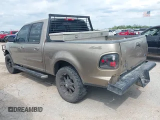 2003 Ford F-150 XLT with VIN 1FTRW08653KA87935, listed as a IAAI auction lot 42101353 with 1 mi miles. Bid and sale history available at carsss.com. Image 3.