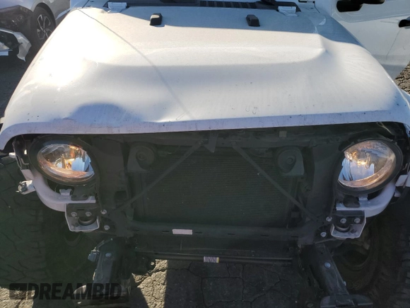 2022 Jeep Gladiator Willys with VIN 1C6HJTAG9NL143314, listed as a Copart auction lot 87974155 with 25,106 mi miles and Salvage title. Bid and sale history available at DreamBid. Image 11.