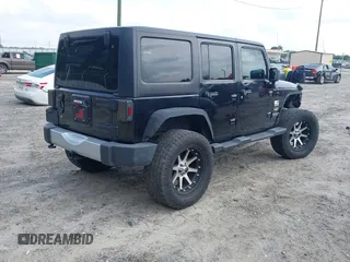 2012 Jeep Wrangler Unlimited Sahara with VIN 1C4HJWEG0CL168300, listed as a IAAI auction lot 42430678 with 70,000 mi miles and . Bid and sale history available at DreamBid. Image 4.