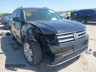 2019 Volkswagen Atlas SE z VIN 1V2WR2CA4KC595211, wystawiony jako IAAI lot #41986643 z przebiegiem 96 299 mil mil oraz . Historia ofert i sprzedaży dostępna na DreamBid. Obrazek 1.