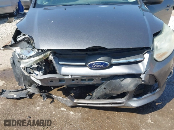 2012 Ford Focus SE с VIN 1FAHP3F20CL456565, выставлен на аукционе IAAI как лот 42045389 с пробегом 164 323 миль миль и . История ставок и продаж доступна на DreamBid. Изображение 6.