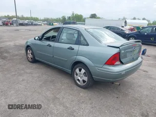 2004 Ford Focus ZTS with VIN 1FAFP38Z74W117402, listed as a IAAI auction lot 42035928 with 113,393 mi miles and . Bid and sale history available at carsss.com. Image 3.