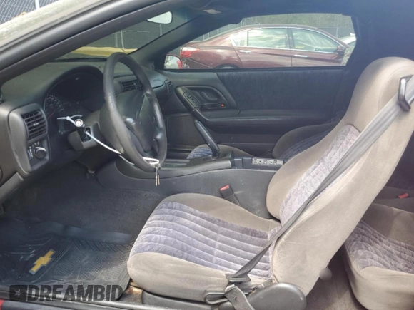 2002 Chevrolet Camaro z VIN 2G1FP22K022159501, wystawiony jako Copart lot #53638655 z przebiegiem 188 233 mil mil oraz Szkoda całkowita • Salvage title. Historia ofert i sprzedaży dostępna na DreamBid. Obrazek 7.