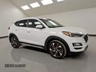 2019 Hyundai Tucson Sport z VIN KM8J33AL3KU874095, wystawiony jako Copart lot #55959415 z przebiegiem 86 092 mil mil oraz Czysty tytuł • Clean title. Historia ofert i sprzedaży dostępna na DreamBid. Obrazek 4.