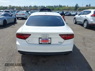 2016 Audi A7 Prestige with VIN WAU2GAFC1GN158272, listed as a IAAI auction lot 42012170 with 99,775 mi miles and . Bid and sale history available at DreamBid. Image 17.