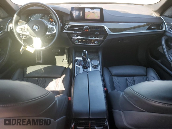 2019 BMW 5 Series M550i xDrive with VIN WBAJB9C57KB289036, listed as a Copart auction lot 86292134 with 28,103 mi miles and Salvage title. Bid and sale history available at DreamBid. Image 8.