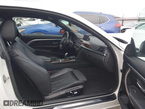 2016 BMW 4 Series 428i with VIN WBA3N7C54GK227475, listed as a IAAI auction lot 40963425 with 87,408 mi miles and . Bid and sale history available at carsss.com. Image 5.