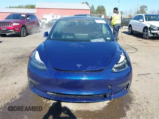 2018 Tesla Model 3 Long Range Battery z VIN 5YJ3E1EB5JF180030, wystawiony jako IAAI lot #41897617 z przebiegiem 89 557 mil mil oraz . Historia ofert i sprzedaży dostępna na DreamBid. Obrazek 12.