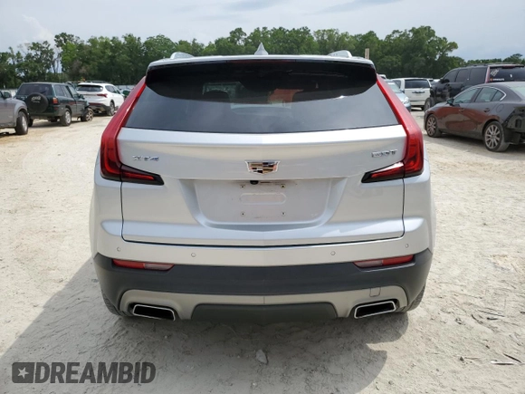 2019 Cadillac XT4 FWD Premium Luxury z VIN 1GYFZCR44KF195554, wystawiony jako Copart lot #55728095 z przebiegiem 35 948 mil mil oraz Nie do naprawy. Historia ofert i sprzedaży dostępna na DreamBid. Obrazek 6.