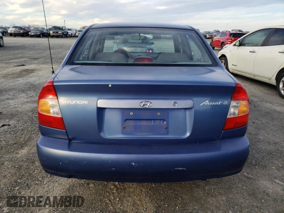 2000 Hyundai Accent z VIN KMHCG45GXYU125691, wystawiony jako Copart lot #87253294 z przebiegiem 91 062 mil mil oraz Szkoda całkowita • Salvage title. Historia ofert i sprzedaży dostępna na DreamBid. Obrazek 6.