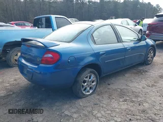 2003 Dodge Neon SXT with VIN 1B3ES56C53D140431, listed as a IAAI auction lot 41418378 with 92,034 mi miles. Bid and sale history available at carsss.com. Image 4.