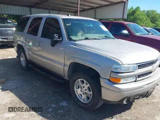 2005 Chevrolet Tahoe Z71 z VIN 1GNEC13TX5R195172, wystawiony jako IAAI lot #42080152 z przebiegiem 132 905 mil mil oraz . Historia ofert i sprzedaży dostępna na DreamBid. Obrazek 1.