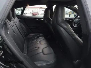 2016 Tesla Model S 70 with VIN 5YJSA1E1XGF154577, listed as a IAAI auction lot 41778697 with 62,630 mi miles and . Bid and sale history available at DreamBid. Image 8.