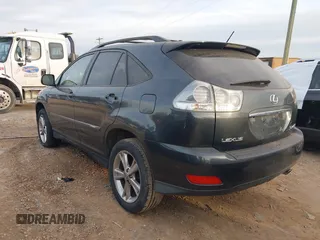 2007 Lexus RX 400h z VIN JTJGW31U372002594, wystawiony jako IAAI lot #41380924 z przebiegiem 243 928 mil mil oraz . Historia ofert i sprzedaży dostępna na DreamBid. Obrazek 3.