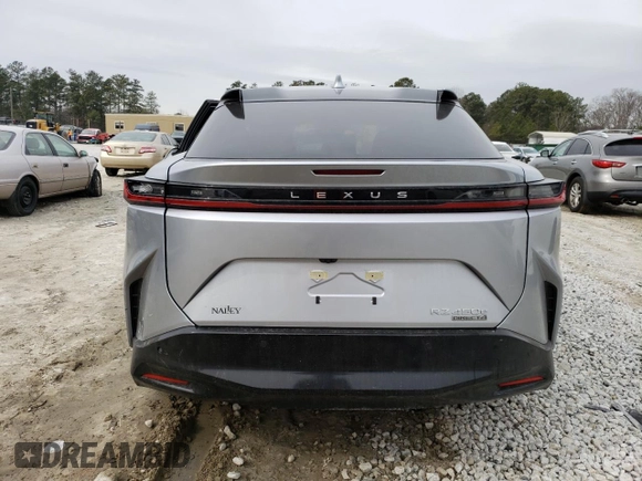 2023 Lexus RZ 450e Premium z VIN JTJAAAAB7PA005835, wystawiony jako Copart lot #42201414 z przebiegiem 2 144 mil mil oraz . Historia ofert i sprzedaży dostępna na DreamBid. Obrazek 6.