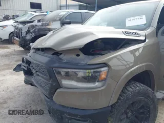 2020 Ram 1500 Big Horn with VIN 1C6SRFFT0LN301093, listed as a IAAI auction lot 41607746 with 65,223 mi miles and . Bid and sale history available at DreamBid. Image 6.