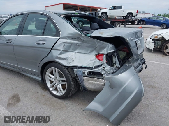 2014 Mercedes-Benz C 250 Sport with VIN WDDGF4HB6EG160494, listed as a IAAI auction lot 42310423 with 145,160 mi miles and . Bid and sale history available at DreamBid. Image 6.