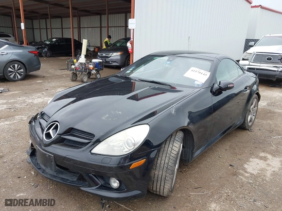 2006 Mercedes-Benz SLK-Class 3.5L with VIN WDBWK56FX6F084328, listed as a IAAI auction lot 41570145 with 104,929 mi miles. Bid and sale history available at carsss.com. Image 17.