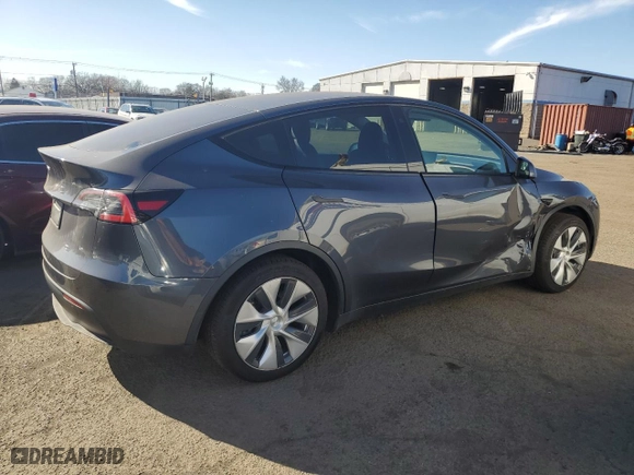 2021 Tesla Model Y Standard Range with VIN 5YJYGDED8MF115065, listed as a Copart auction lot 49420235 with 111,018 mi miles and Salvage Title. Bid and sale history available at carsss.com. Image 3.