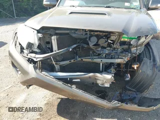 2015 Toyota Tacoma with VIN 3TMMU4FN5FM082376, listed as a IAAI auction lot 42144113 with 98,244 mi miles and . Bid and sale history available at DreamBid. Image 6.