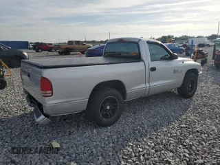 2001 Dodge Dakota с VIN 1B7FL26X31S345868, выставлен на аукционе Copart как лот 61427515 с пробегом 87 073 миль миль и Списание • Salvage title. История ставок и продаж доступна на DreamBid. Изображение 3.