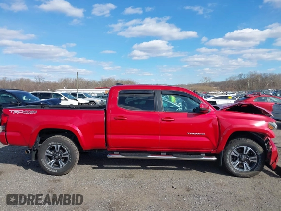 2016 Toyota Tacoma SR5 with VIN 3TMDZ5BN9GM012720, listed as a IAAI auction lot 41664651 with 119,010 mi miles and . Bid and sale history available at DreamBid. Image 13.