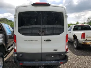 2018 Ford Transit z VIN 1FTYR2CMXJKA85664, wystawiony jako Copart lot #62708365 z przebiegiem Nie podano mil oraz Szkoda całkowita • Salvage title. Historia ofert i sprzedaży dostępna na DreamBid. Obrazek 6.