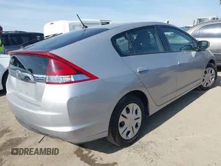 2012 Honda Insight LX с VIN JHMZE2H56CS001570, выставлен на аукционе IAAI как лот 41461236 с пробегом 129 431 миль миль и . История ставок и продаж доступна на DreamBid. Изображение 4.
